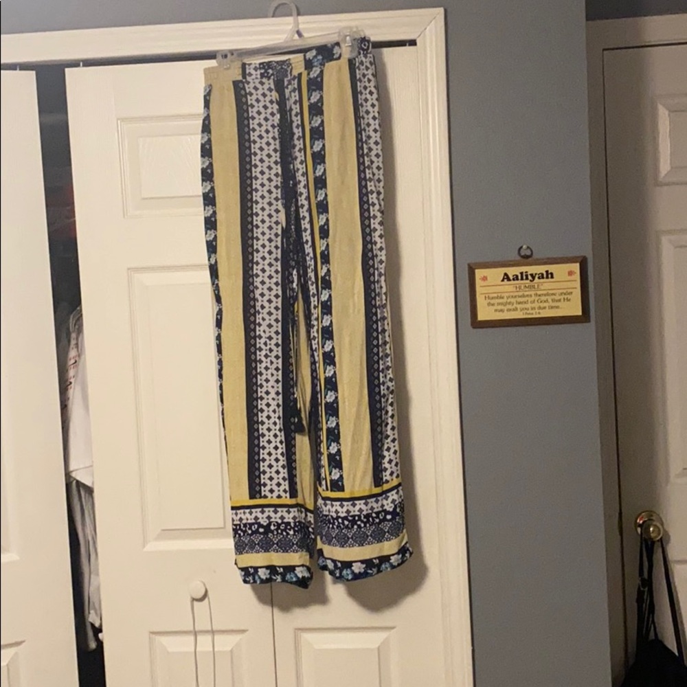 Navy blue, white, and yellow loose pants